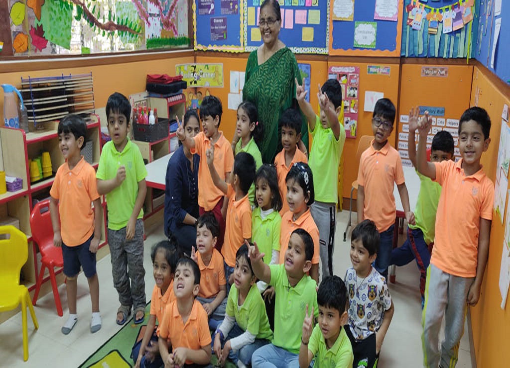 Grandparents read stories from their childhood on International Mother Tongue Day.